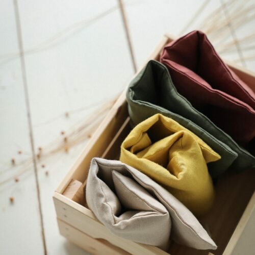 Housse pour grande bouillotte en graines de lin, tissu en lin naturel beige, fabrication artisanale en France.