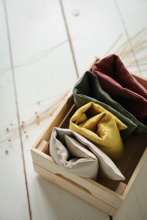 Housse pour grande bouillotte en graines de lin, tissu en lin naturel beige, fabrication artisanale en France.